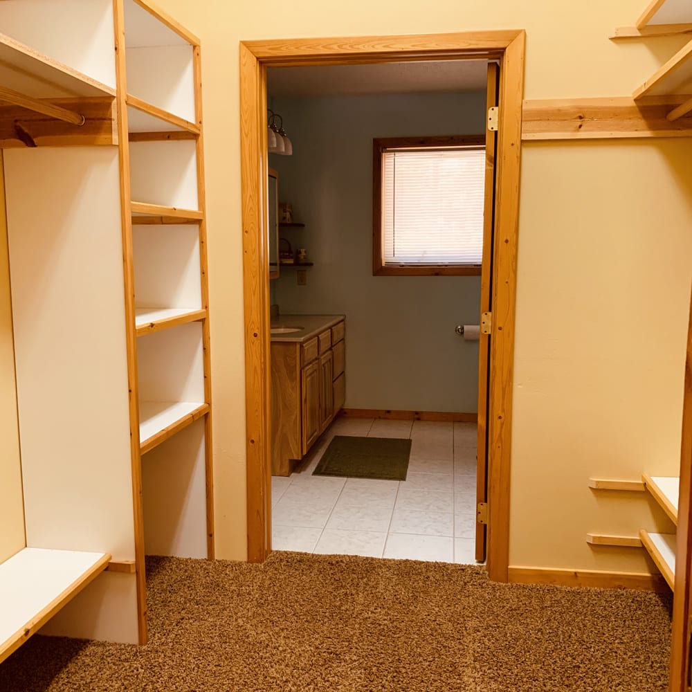 Spruce cabin master closet